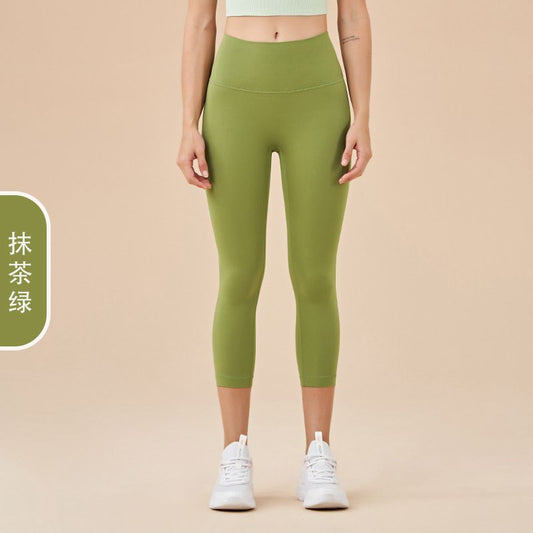 Ladies' New High-waisted Cropped Trousers Yoga Pants with No Embarrassment, Back Pocket Peach Hip-lifting Exercise Pants.