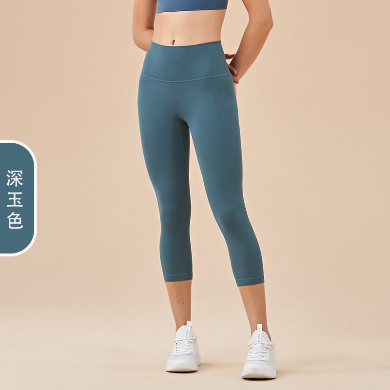 Ladies' New High-waisted Cropped Trousers Yoga Pants with No Embarrassment, Back Pocket Peach Hip-lifting Exercise Pants.