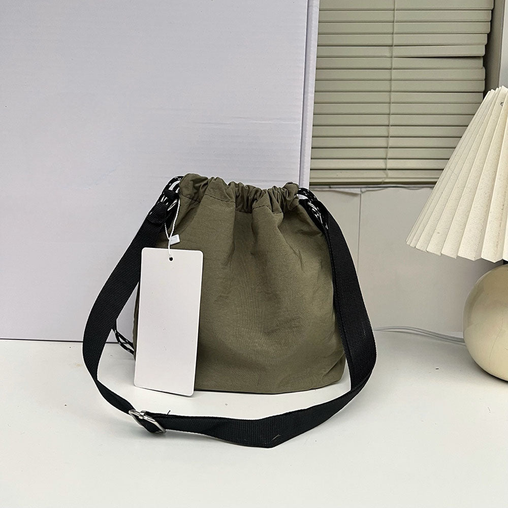LU New Leisure Shoulder Slung Adjustable Speed Dry Waterproof Small Bag. (Upper Width: 24.5cm Lower Width: 20.5cm Height: 19.5cm)