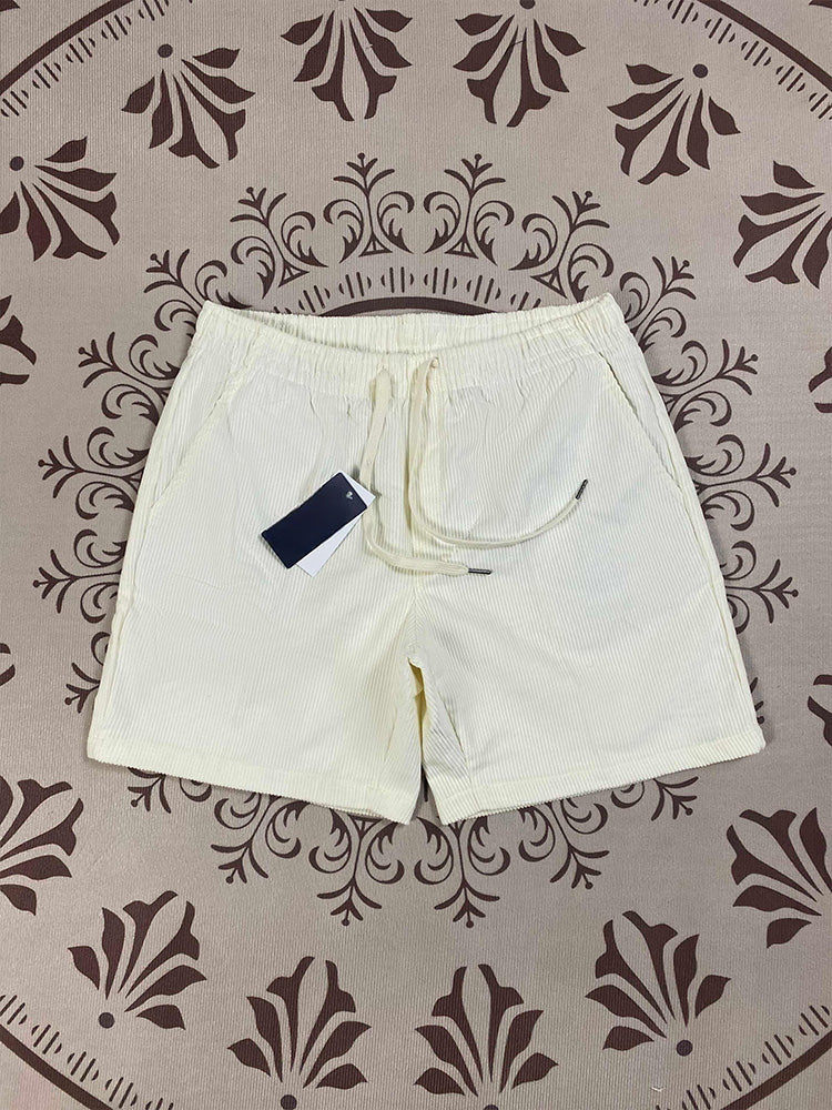 Men and women with the same new Joker couple style corduroy fabric elastic waist casual shorts.