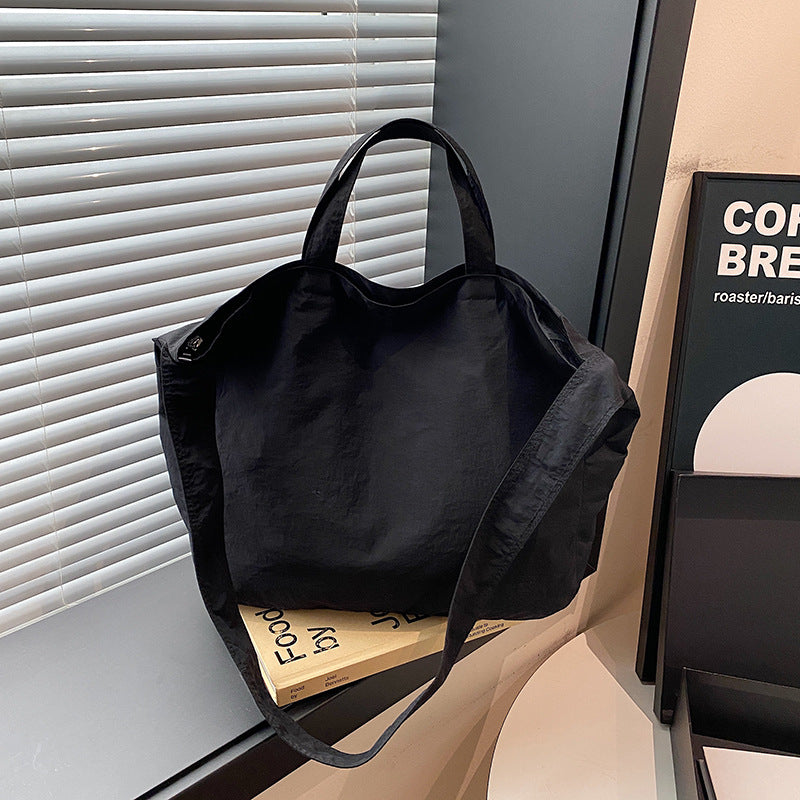 Women's New Portable Canvas Hand-held Pocket Large-capacity Leisure Joker Shoulder Slung Tote Bag