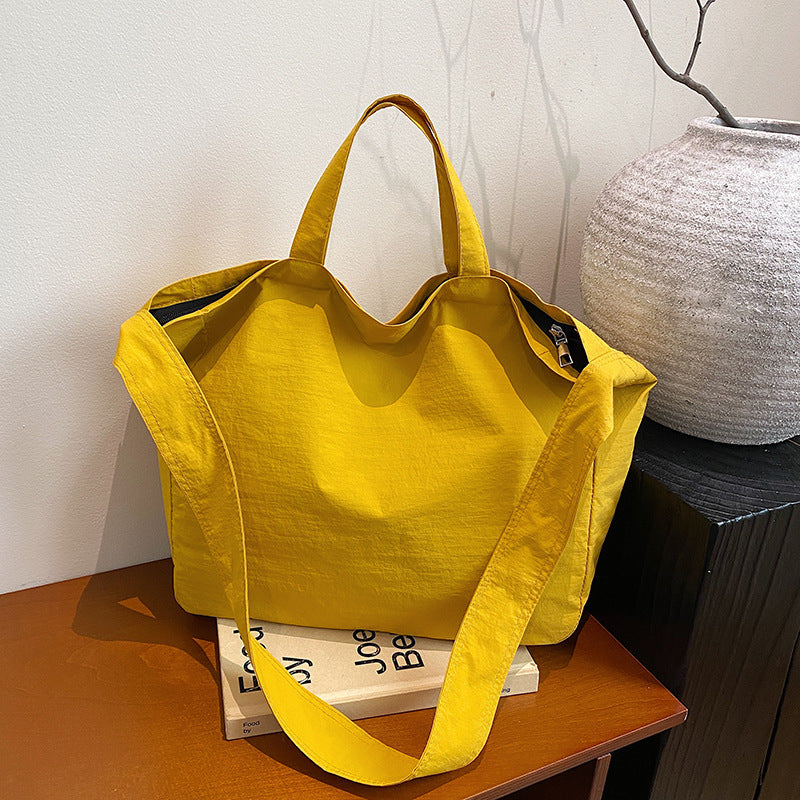 Women's New Portable Canvas Hand-held Pocket Large-capacity Leisure Joker Shoulder Slung Tote Bag