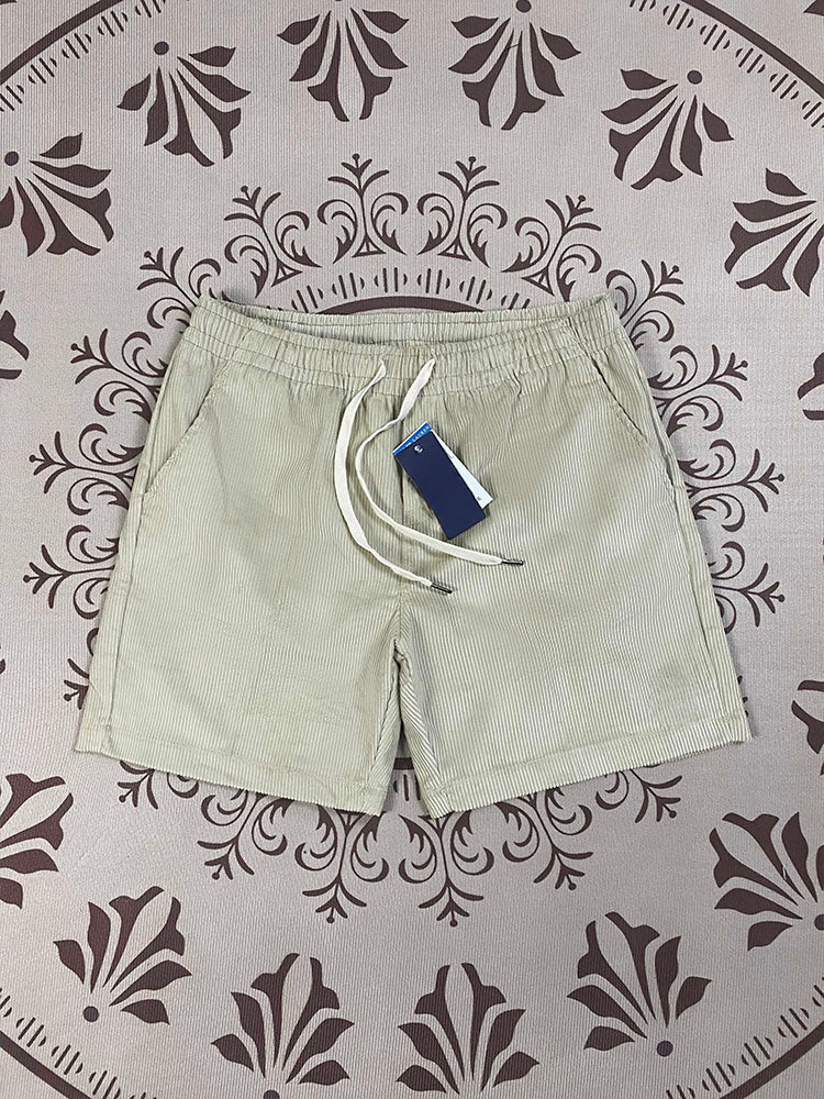 Men and women with the same new Joker couple style corduroy fabric elastic waist casual shorts.