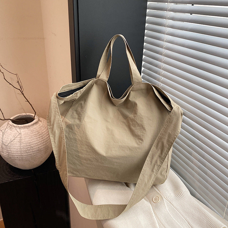 Women's New Portable Canvas Hand-held Pocket Large-capacity Leisure Joker Shoulder Slung Tote Bag