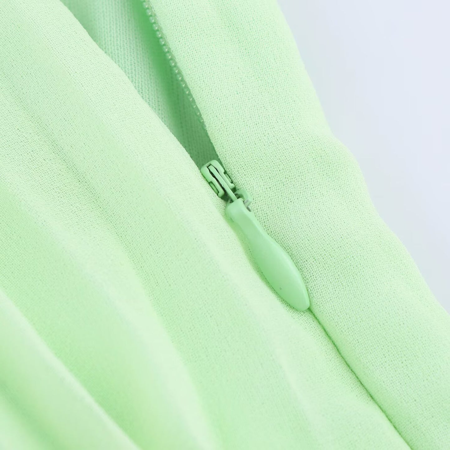 Women's new fashion casual versatile solid pleated MIDI skirt retro high waisted side zipper women's skirt