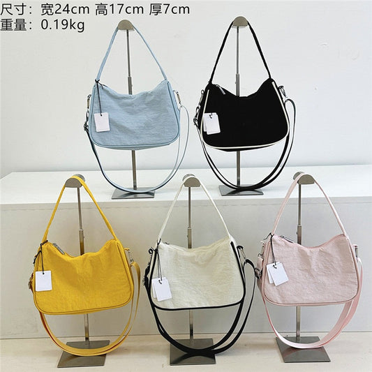 2025 shoulder slung jiaozi waterproof leisure bag