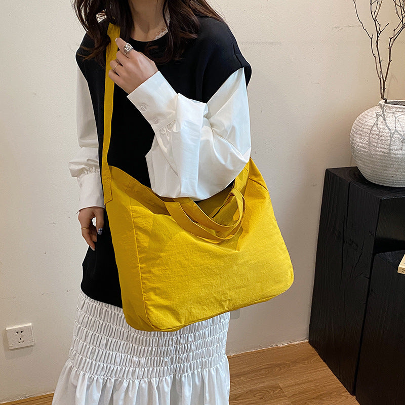 Women's New Portable Canvas Hand-held Pocket Large-capacity Leisure Joker Shoulder Slung Tote Bag